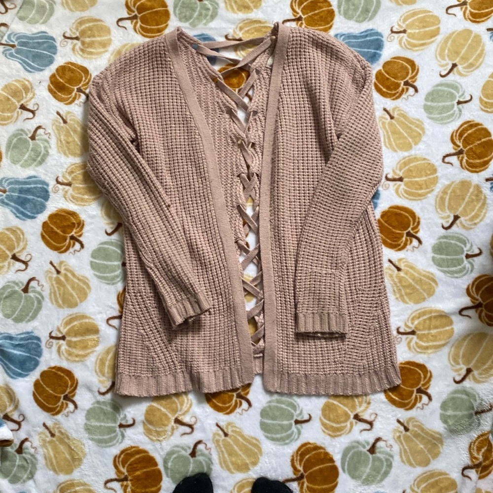 Cute pink rose cardigan that’s a Medium but fits like a small.